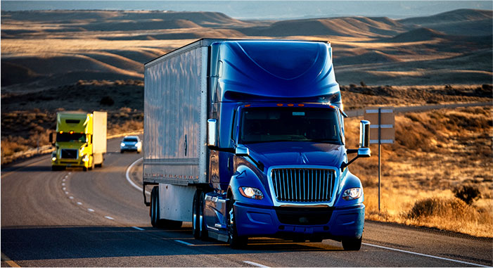 Truck driving on North American highway for carrier needing transportation audits